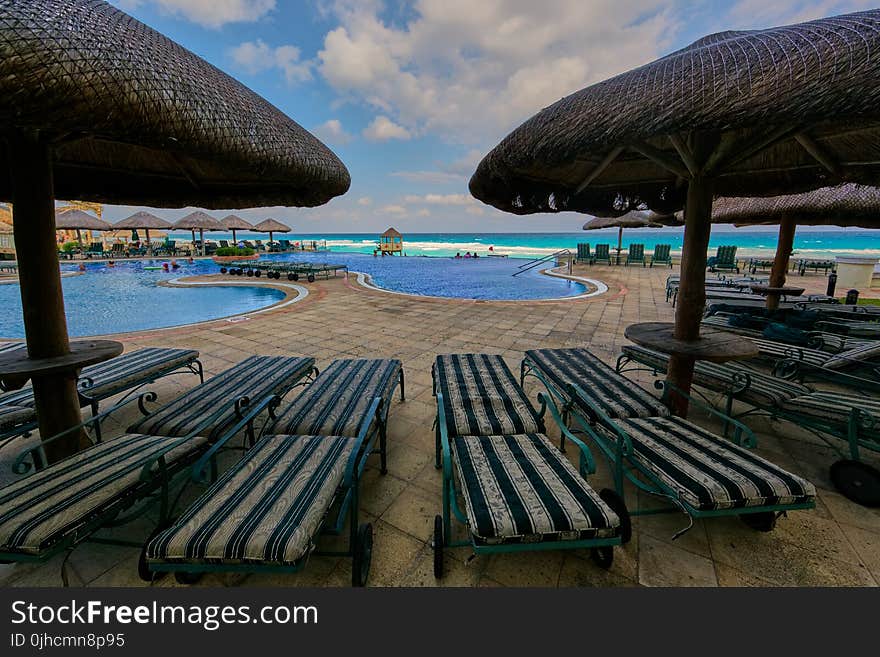 Bunch of Sun Lounger Near Pool