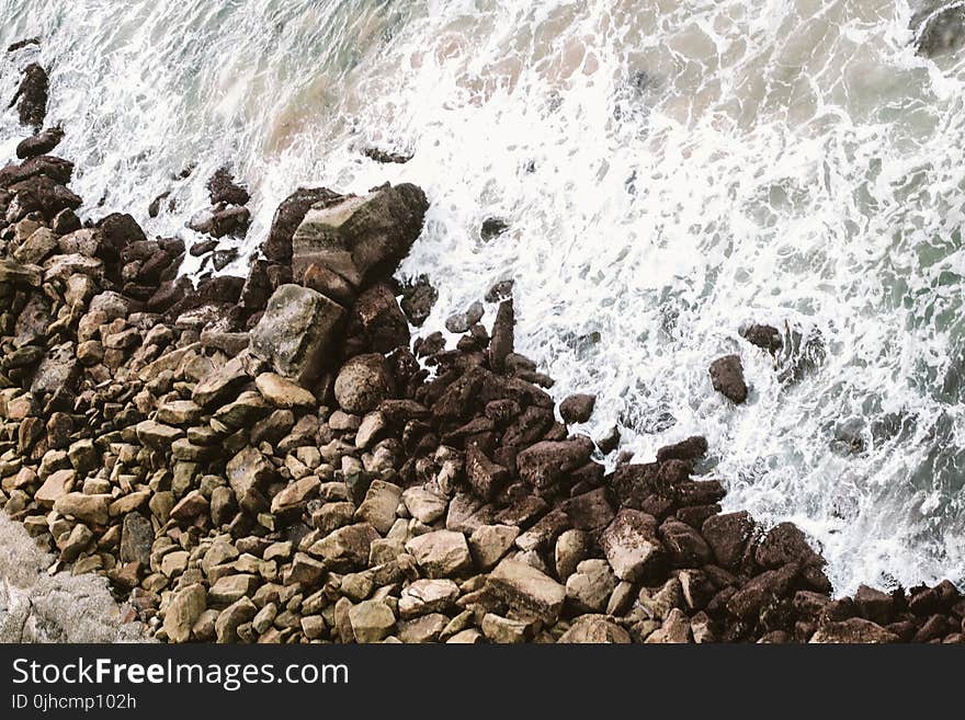 Brown Rocks On Shore