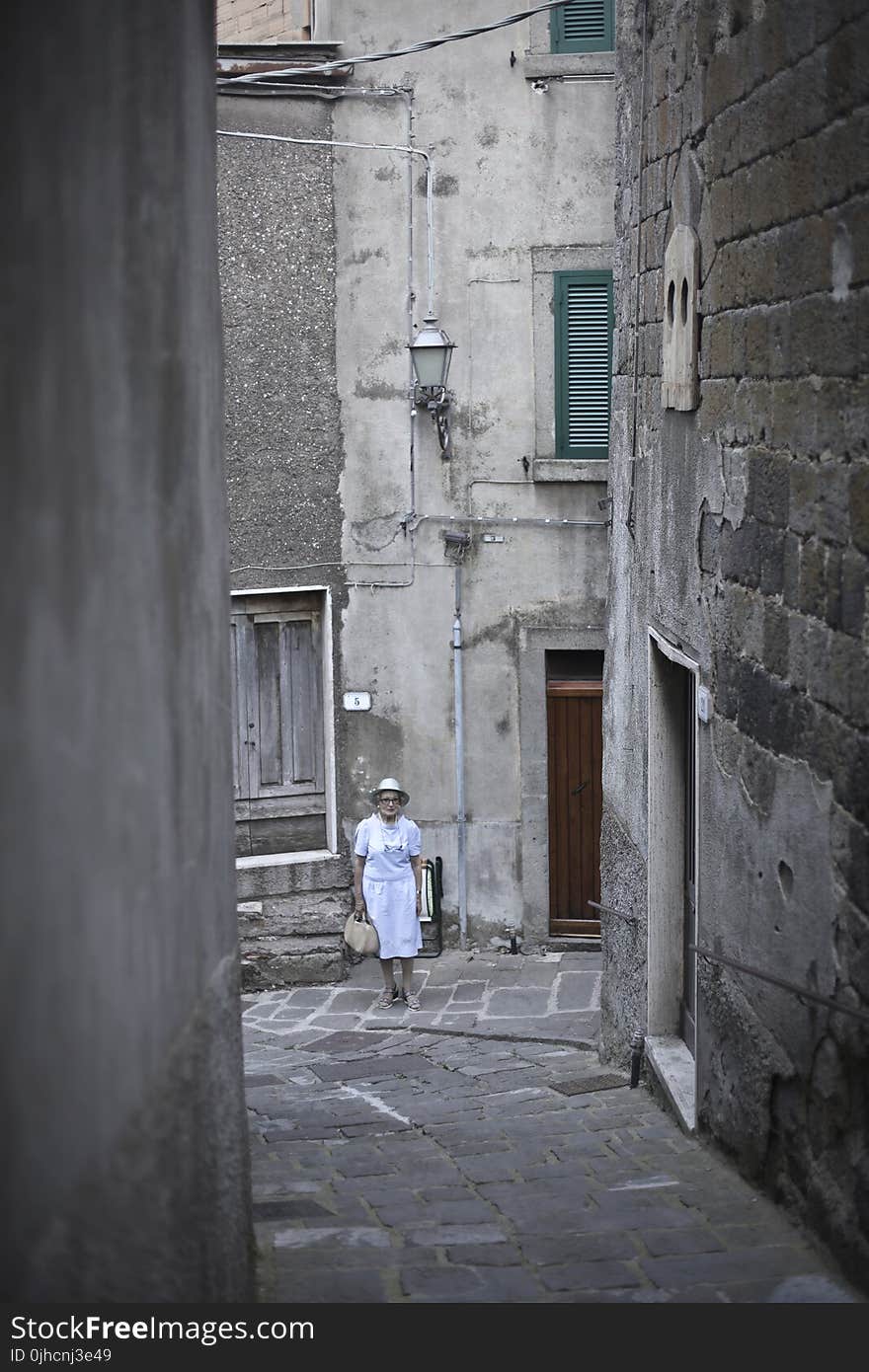 Woman In White Dress Walking