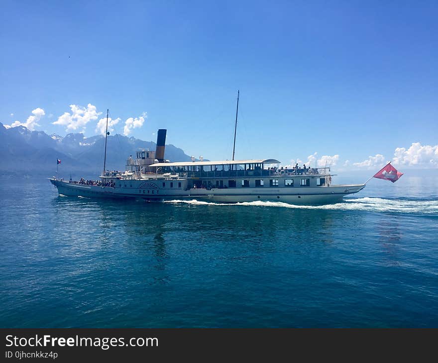 Brown Cruise Ship on Body of Water