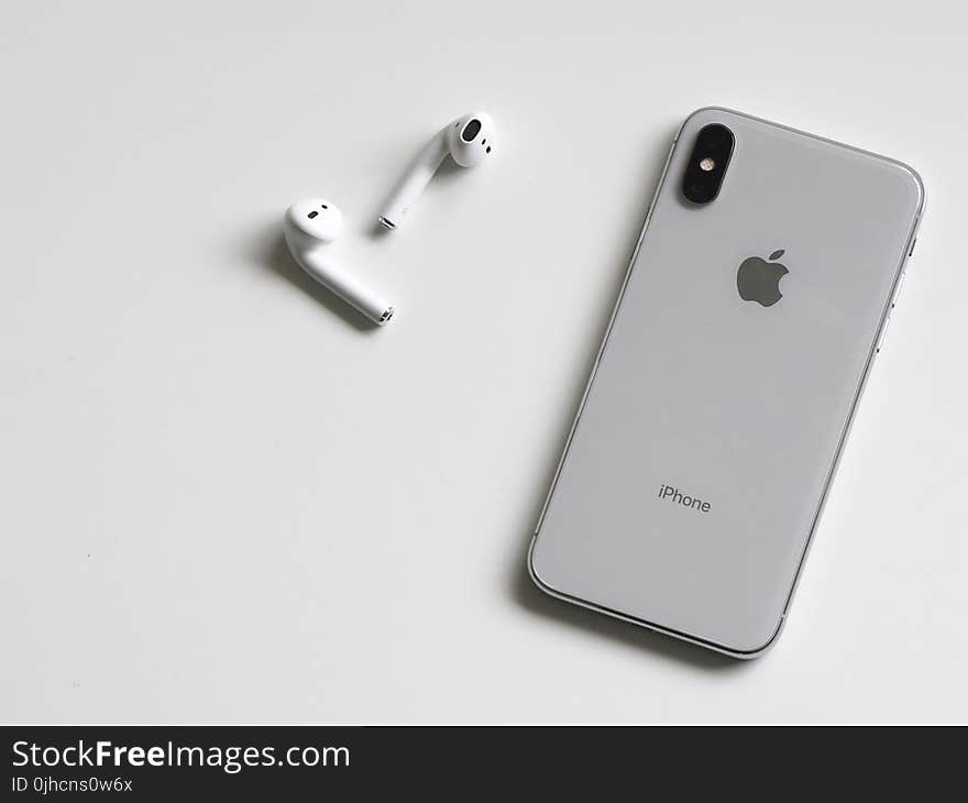 Silver Iphone X With Airpods