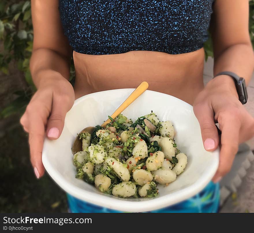 Person Holding Bowl With Mixed Food