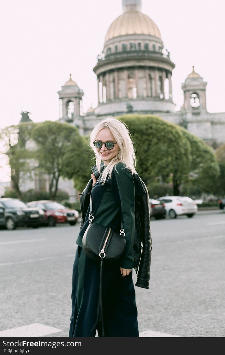 Women&#x27;s Black Jacket and Black Skirt Near Building