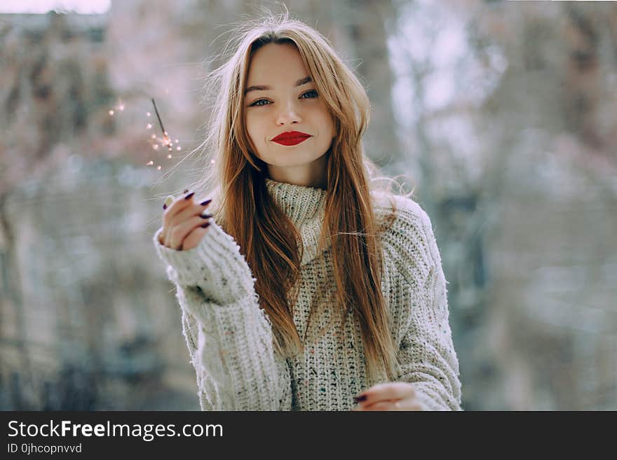 Woman Wearing Gray Mock Neck Sweater