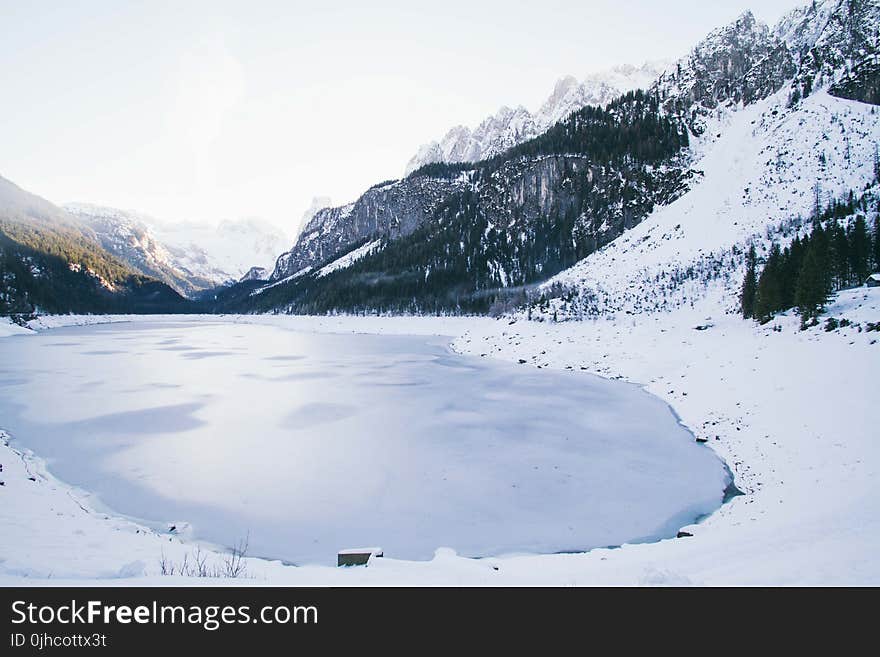 Landscape Photo of Lake Surrounded With Snow