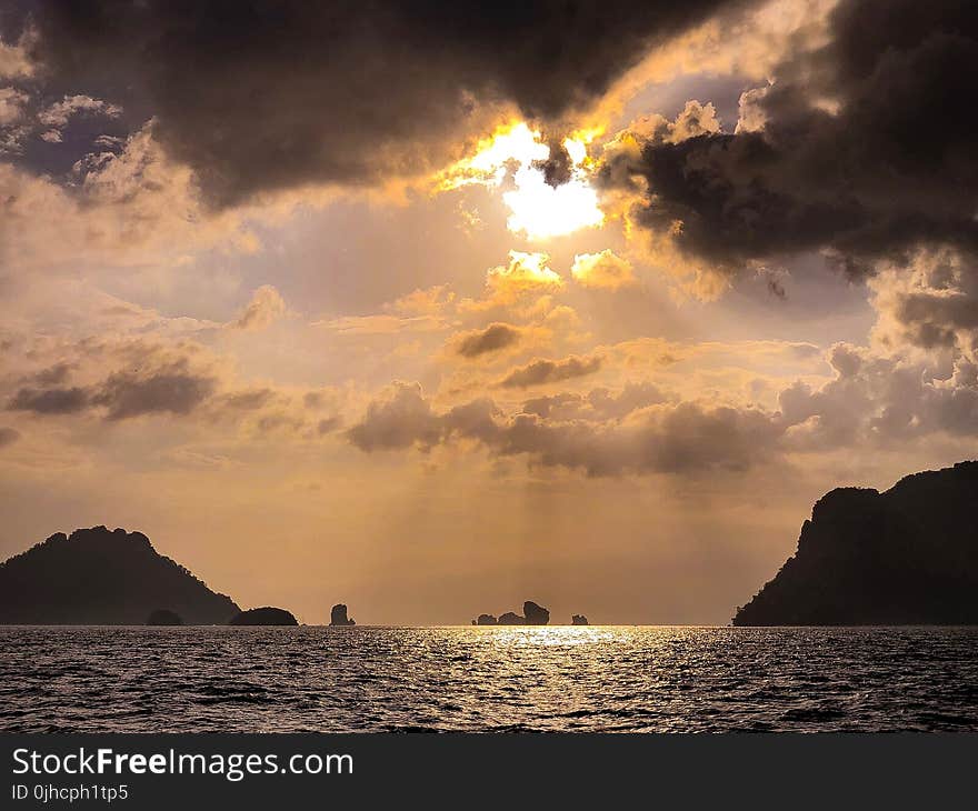 Sun Rays over Sea With Islands