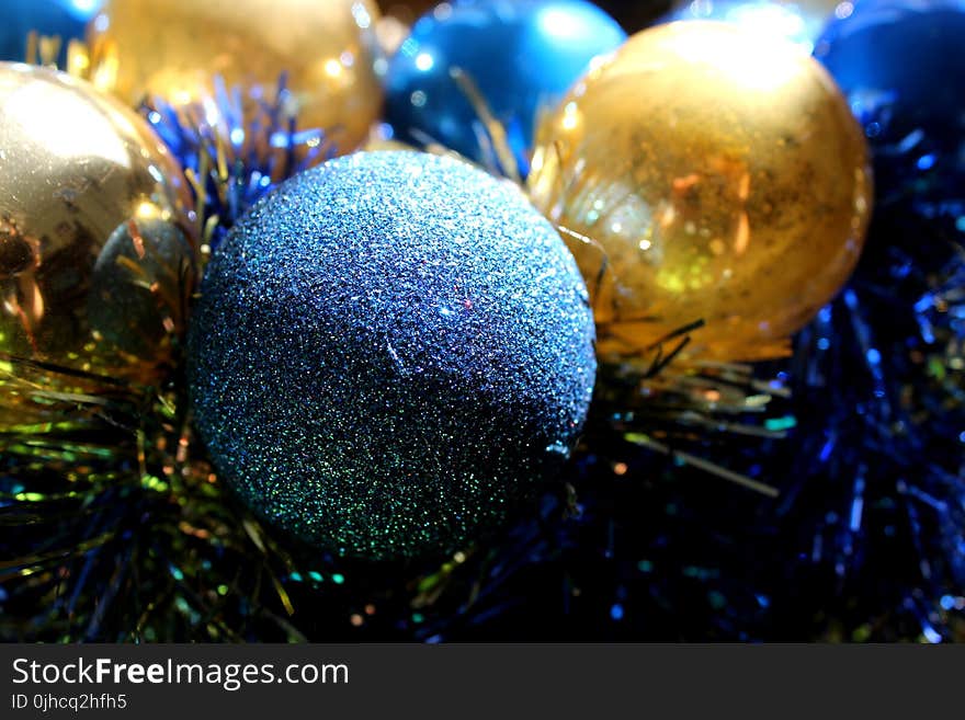 Gray, Blue, and Gold-colored Baubles