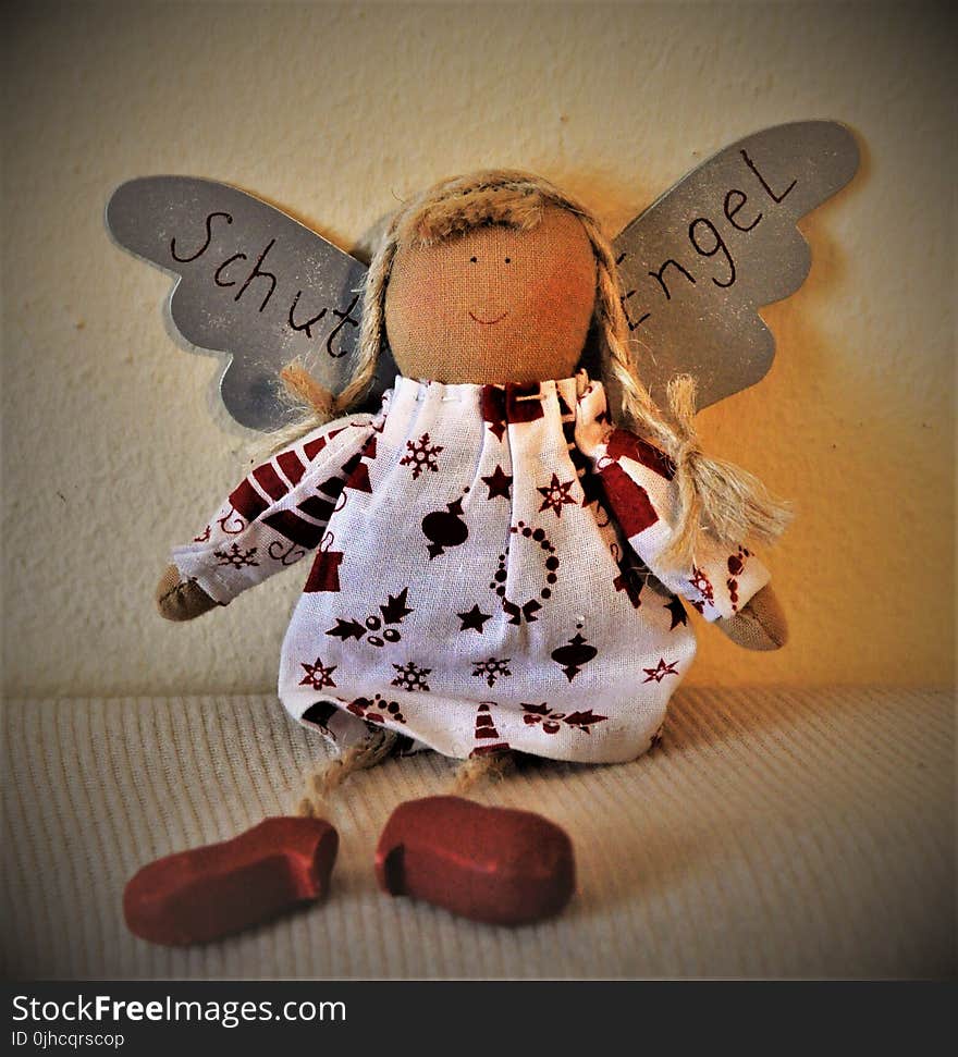 Brown and White Angel Doll