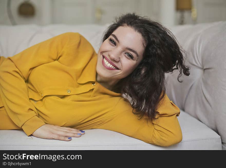 Woman In Yellow Button-up Top