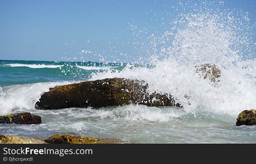 Photography of Sea Waves Under Blue Sky