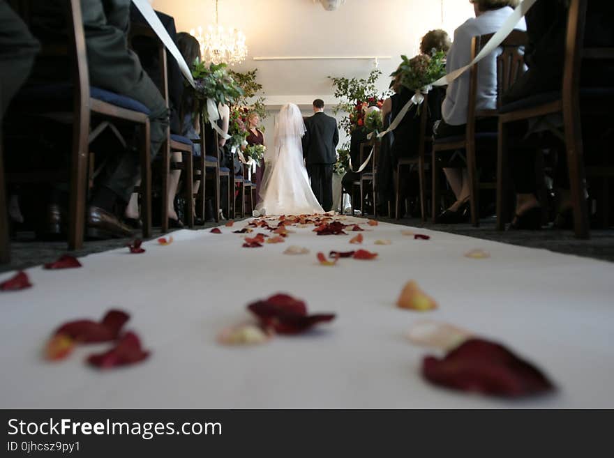 Bride and Groom Walking Down the Aisle