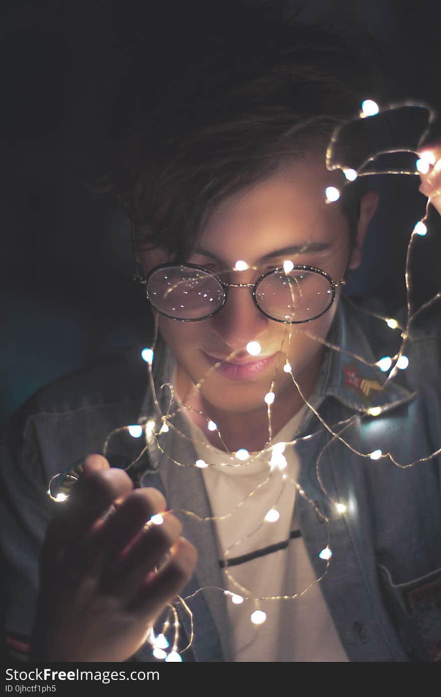 Photography of Man Wearing Eyeglasses