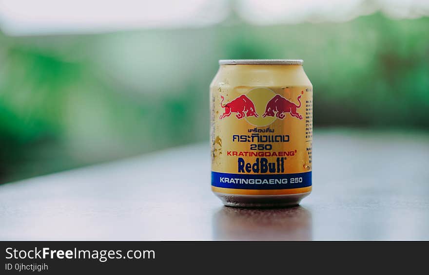 Close-up Photography of Red Bull in Can