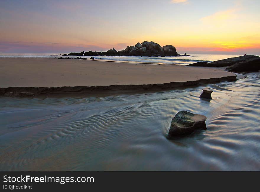 Scenic View of Ocean During Dusk