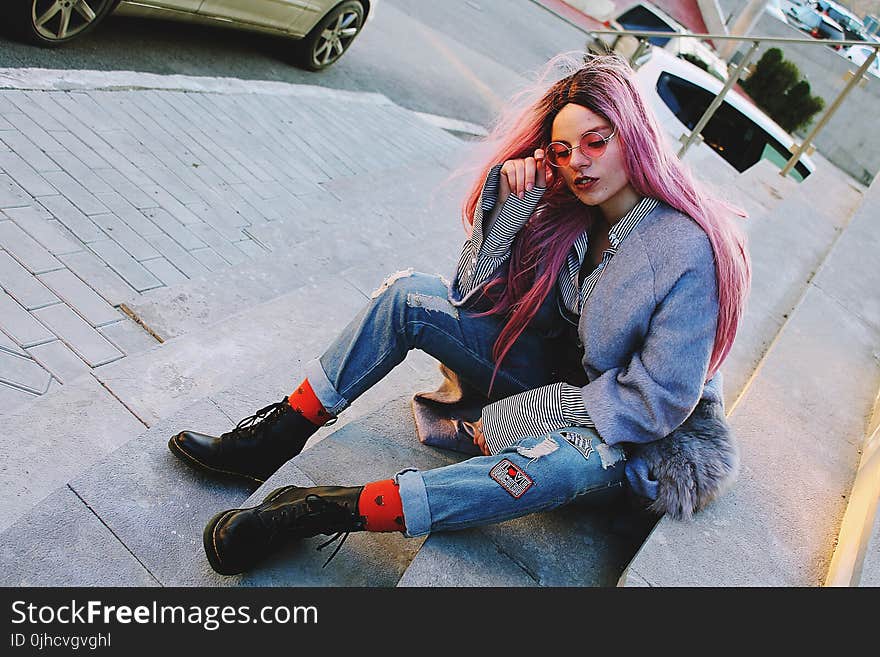 Woman in Gray Jacket and Lbue Jeans