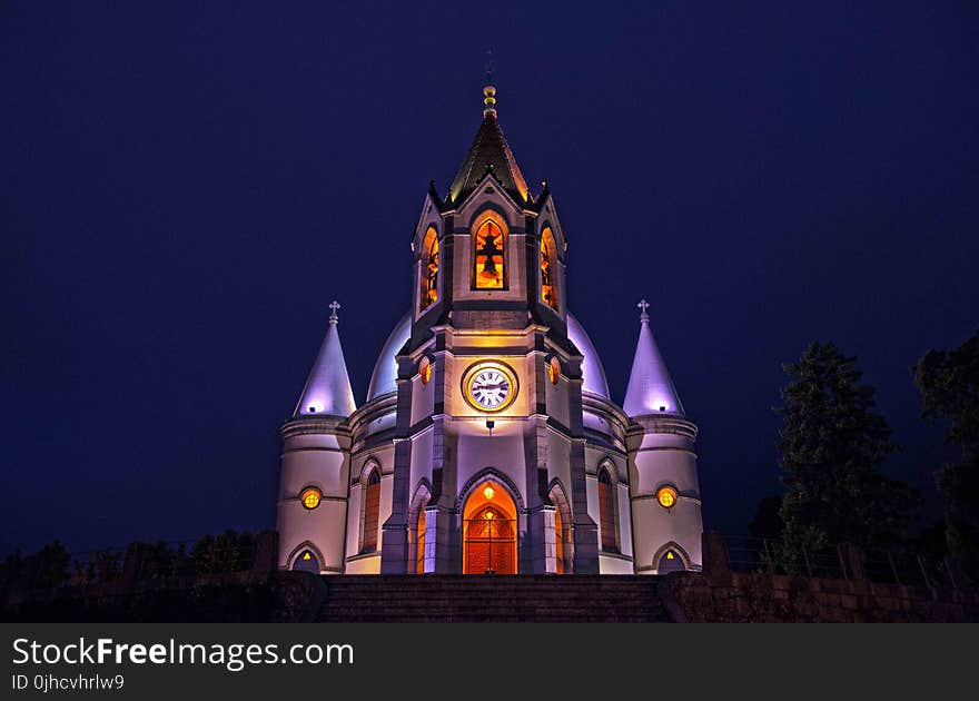 Gray and White Concrete Cathedral With Lights Photo