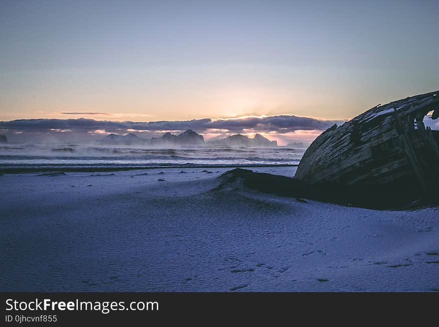 Brown Sand Under White Sky