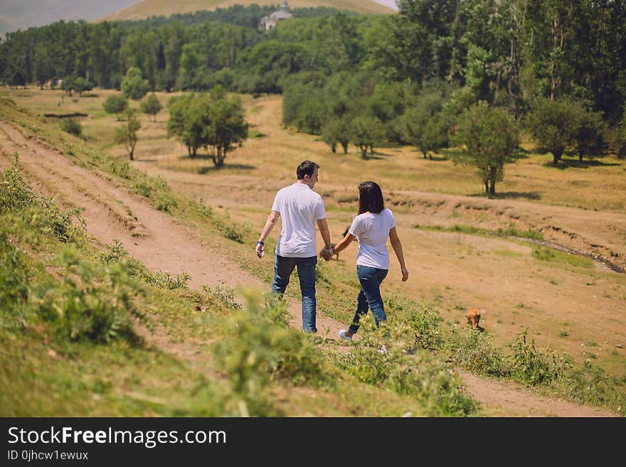 Man and Woman Walking