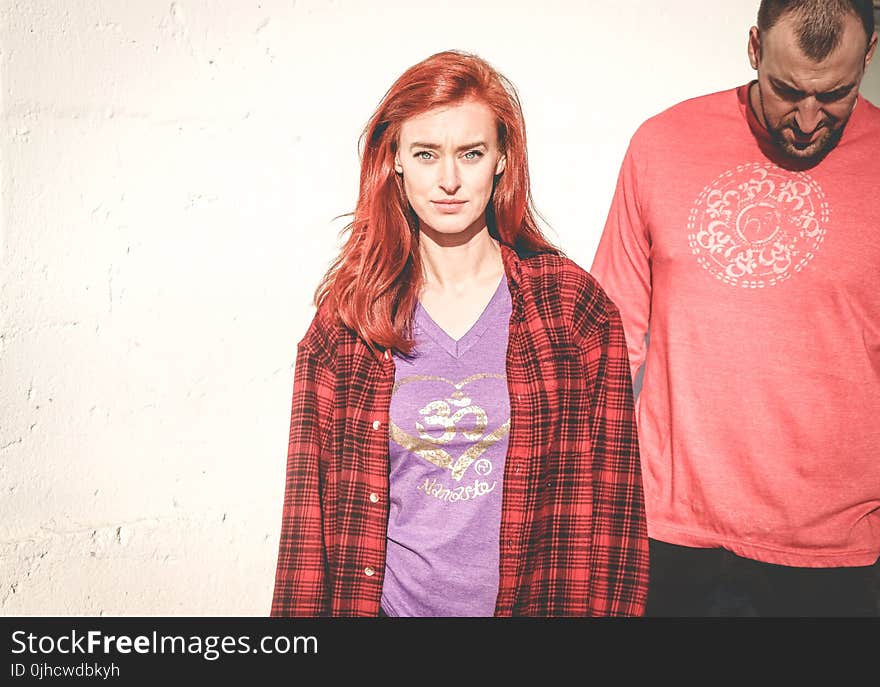 Woman Wearing Red and Gray Plaid Sports Shirt