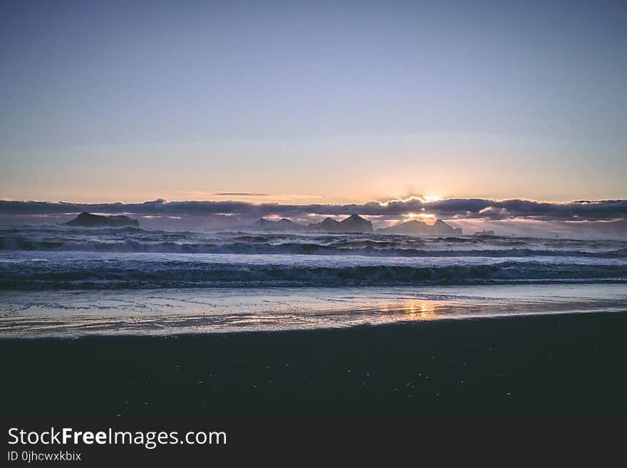 Photo of Sea Waves during Sunset