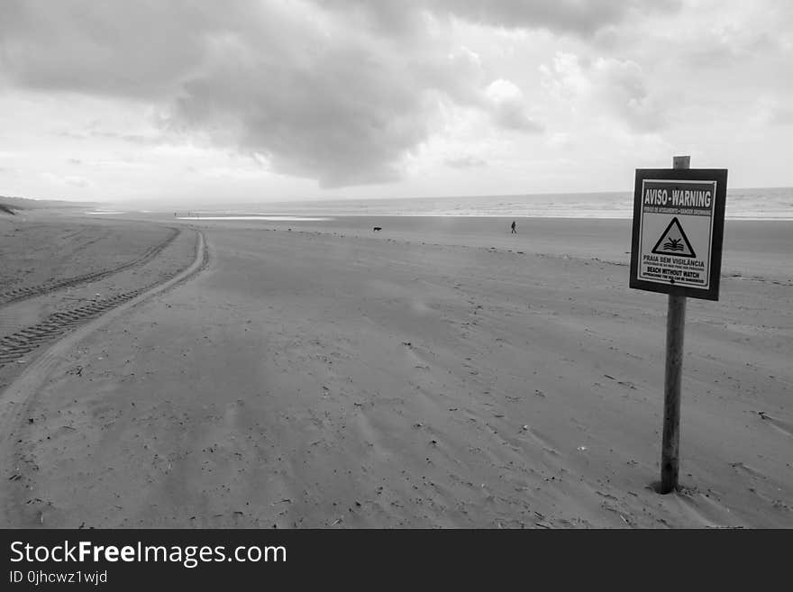 Grayscale Photo of Sand