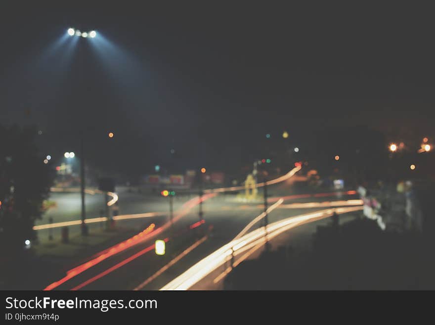 Timelapse Photography of Roadway With Car during Nighttime