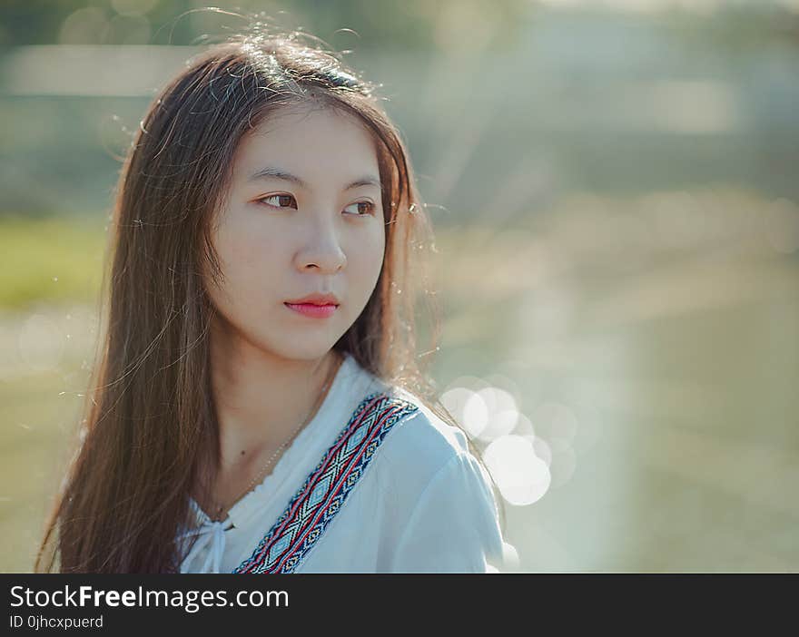 Shallow Focus Photography of Woman Wearing White Shirt