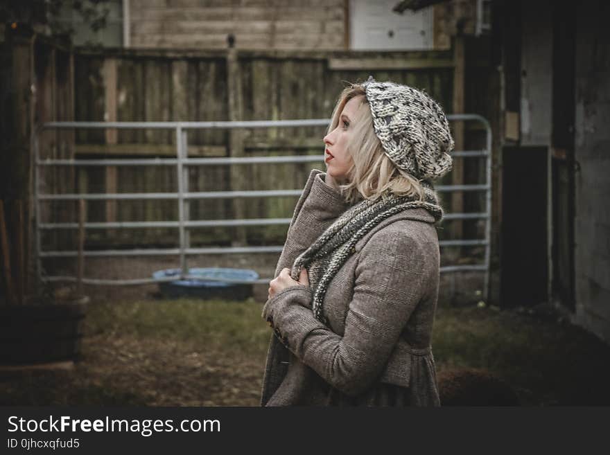 Woman Wearing Gray Hoodie and Knit Cap