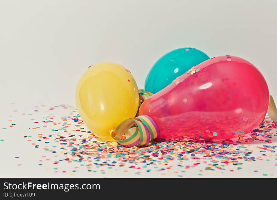 Yellow, Pink, and Blue Party Balloons