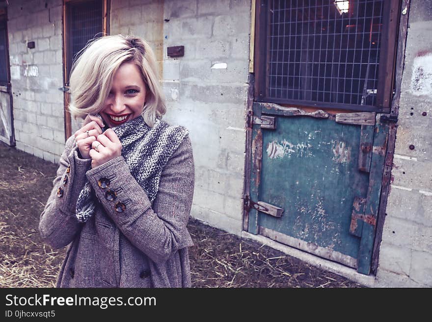 Woman Near on Door Wearing Coat