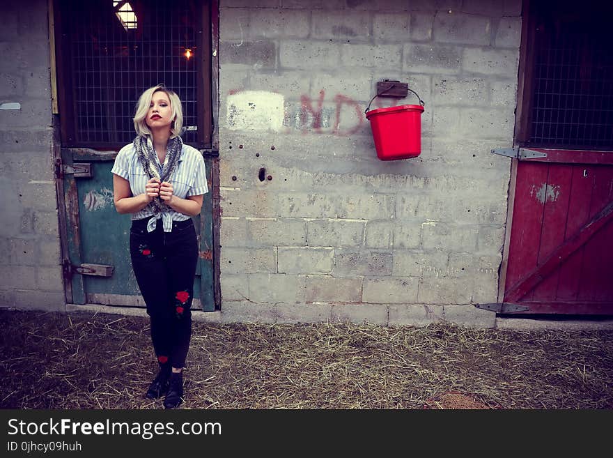 Woman in Gray Button-up Shirt and Black Pants