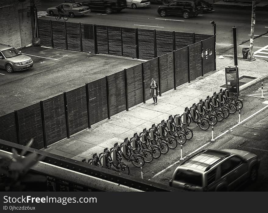 Grayscale Photo of Bikes