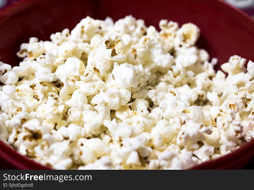 Selective Focus Photography of Popcorns on Bowl