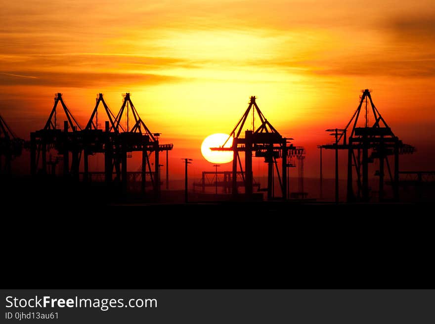 Silhouette Photo of Houses during Golden Hour Sunset