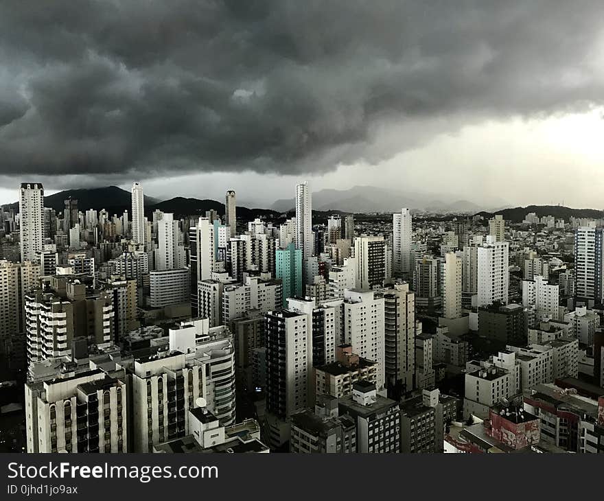 High-rise Building Under Cloudy Sky at Daytime