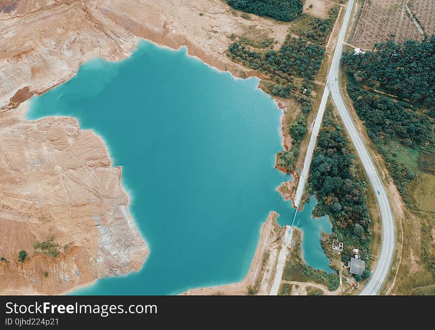 Aerial Photo of Lake Near Highway