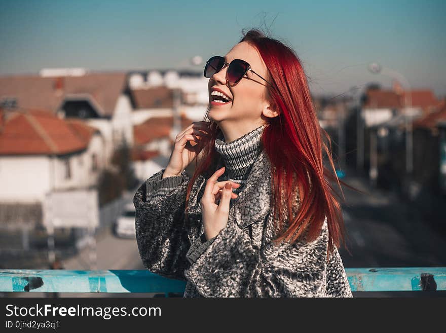 Woman In Grey Sweatshirt