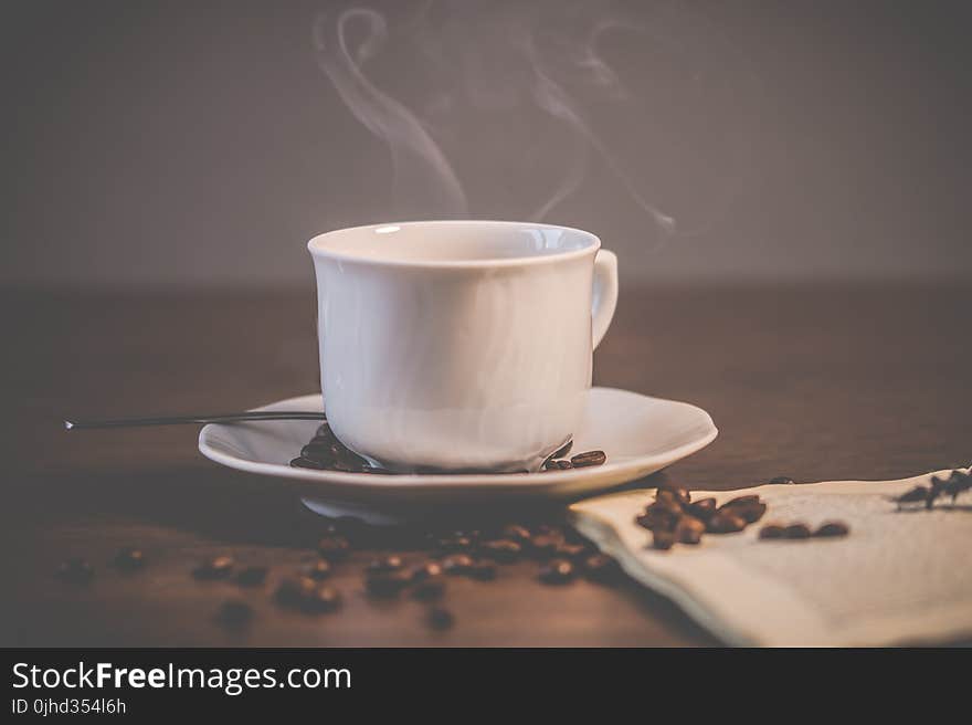 White Ceramic Coffee Mug With Saucer