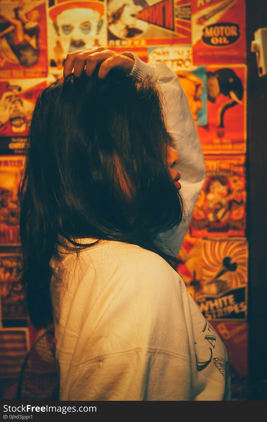 Woman in White and Black Long-sleeved Shirt