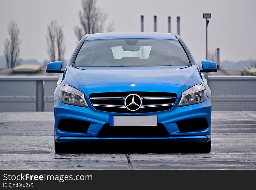 Blue Mercedes Benz Car Parked