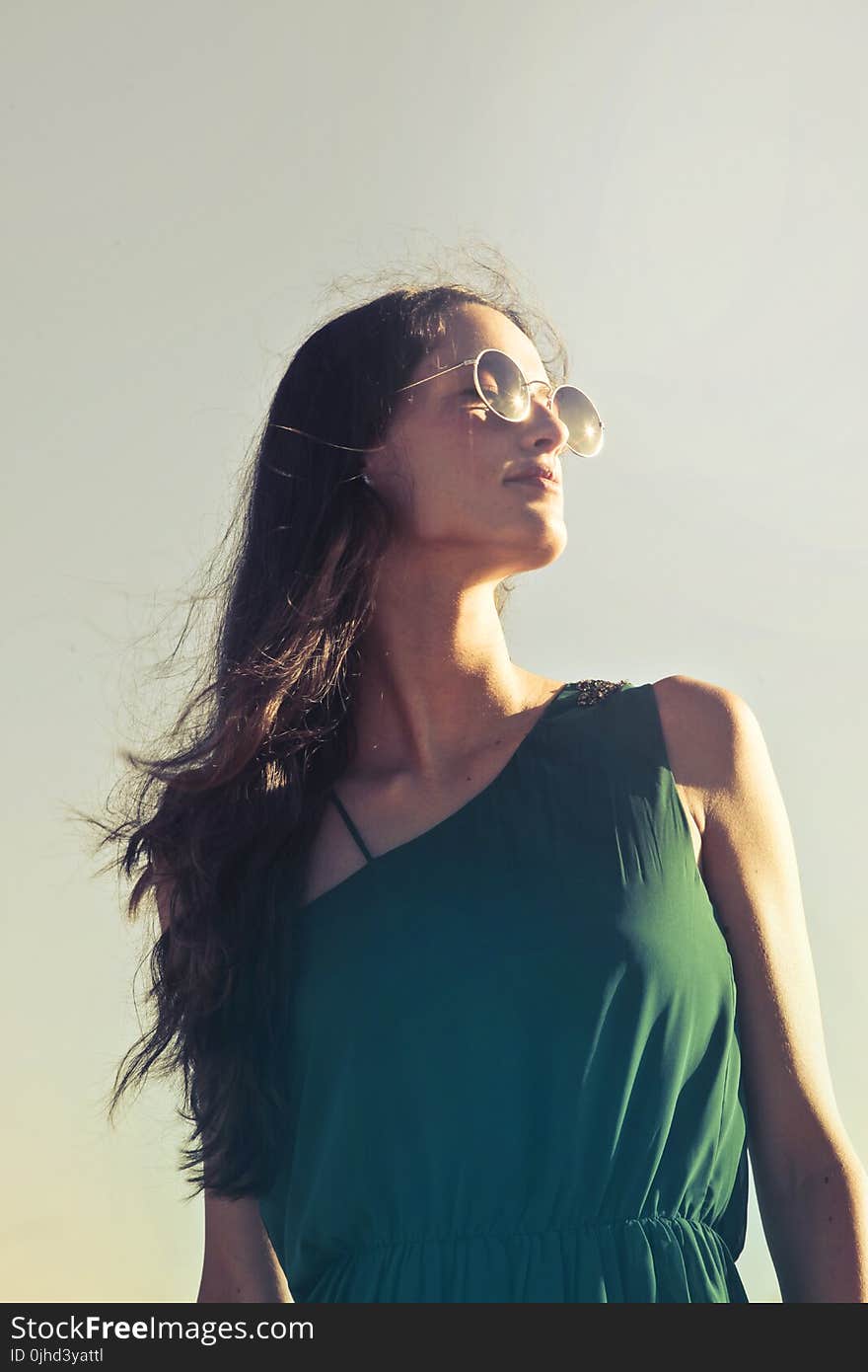 Photography of a Woman Wearing Sunglasses