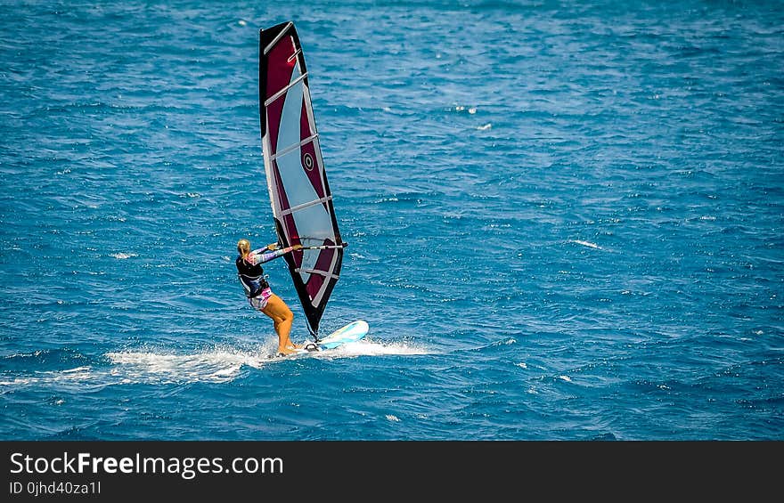 Person Doing Surfboarding