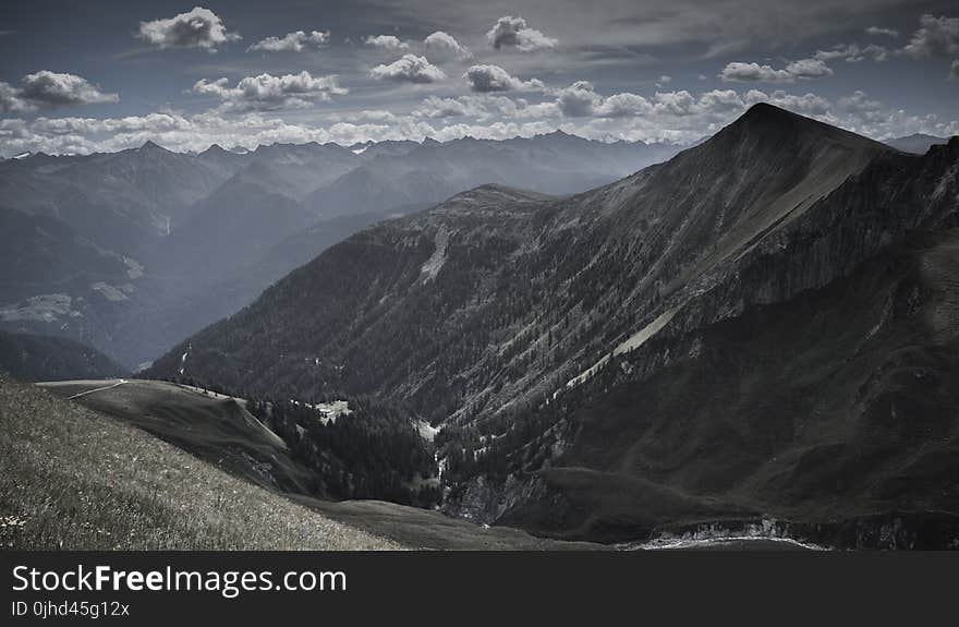 Mountain Under White Clouds at Daytime