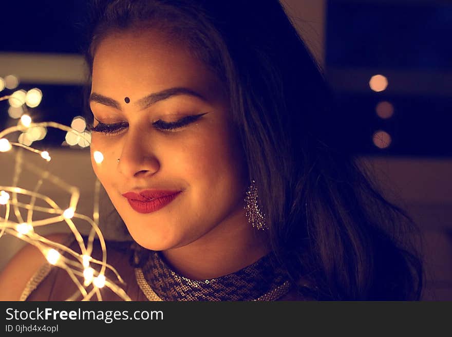 Woman With Red Lipstick And Black Bindi