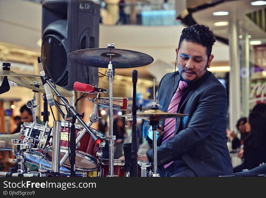 Man Playing Drum Inside Mall