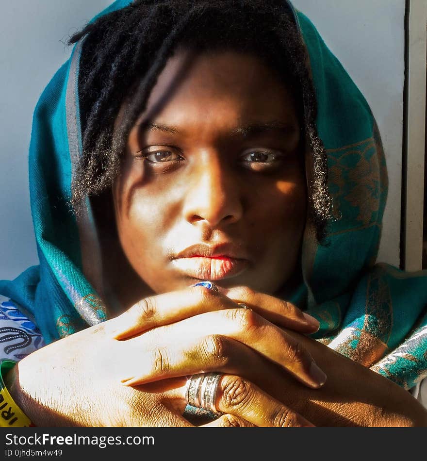 Woman With Dreaded Hair Wearing Green Hijab