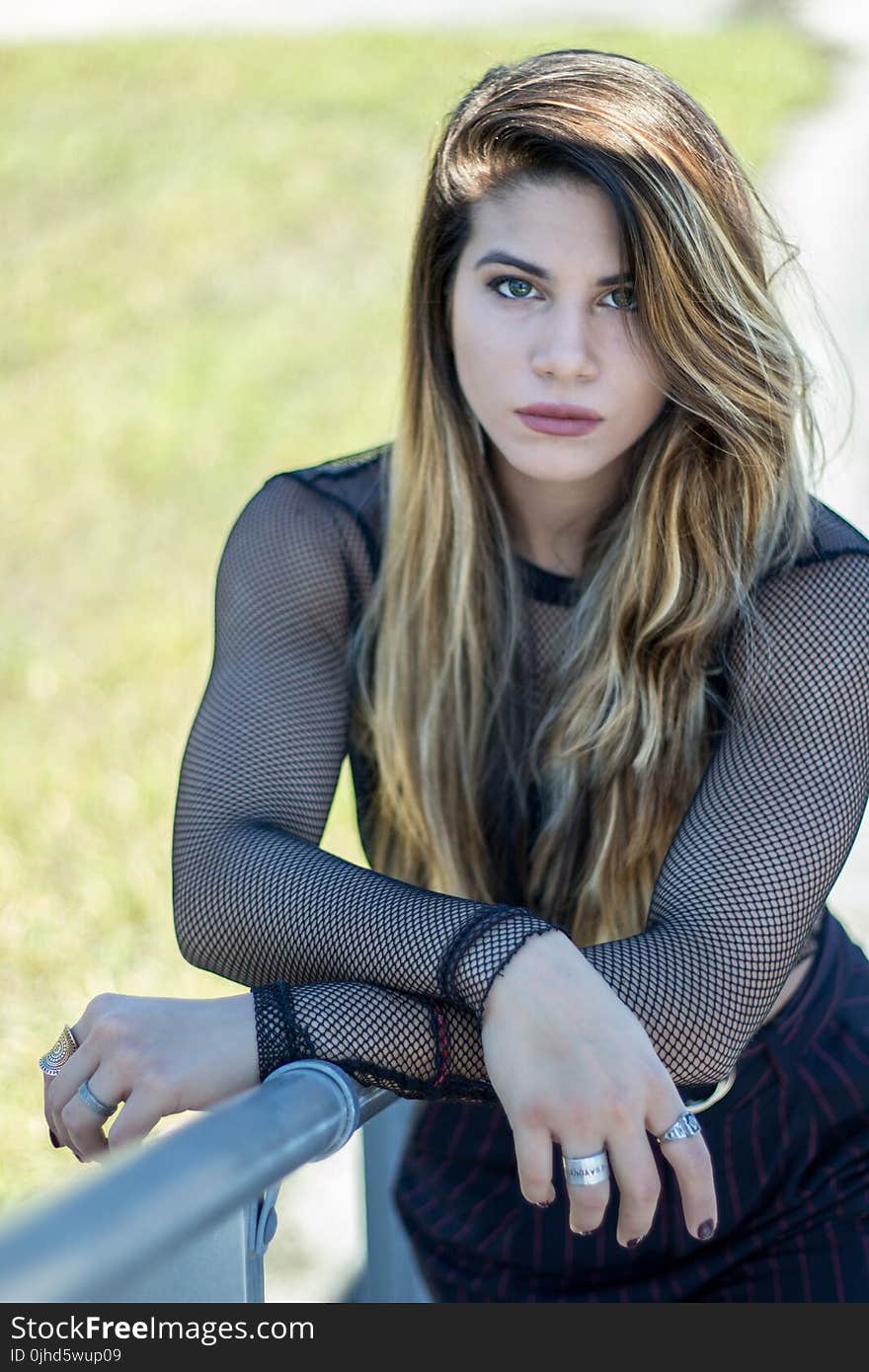 Woman Wearing Black Mesh Blouse