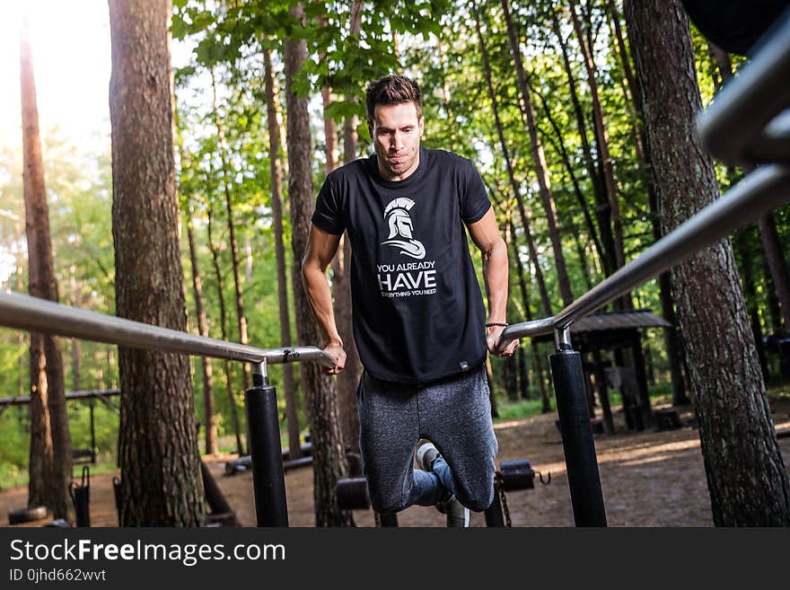 Man In Black T-shirt Doing Exercise