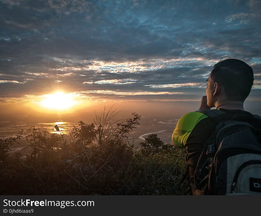 Man Carrying Backpack