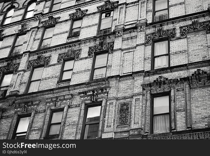 Gray Scale Photo of Multi-storey Building